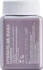 A small bottle of Kevin Murphy Hydrate-Me.Wash shampoo. Produktbild-Vorschau