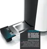 Close-up of a toaster crumb tray with text overlay explaining cleaning instructions. Voir les images du produit