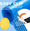 A rolled-up blue solar pool cover with text overlays and an illustration of a clip. Náhľad obrázku produktu