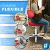 A collage of images showing a red rolling stool with a backrest in different settings, including a workshop, a cosmetic setup, and a dental chair area. A woman is shown using the stool in the main image. Náhľad obrázku produktu