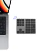A laptop and a wireless numeric keypad are shown side-by-side on a white background. Náhled obrázku produktu
