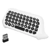 A white wireless keyboard with black keys and a USB receiver on a white background. Produktbild-Vorschau