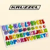 A wooden puzzle board with colorful alphabet letters and numbers. Náhled obrázku produktu