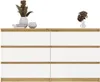 A white and wood dresser with decorative items on top. Podgląd zdjęcia produktu