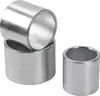 Three metal sleeves are shown against a white background. Two are stacked on top of each other on the left, and one is to the right. Náhled obrázku produktu