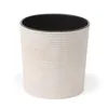 A close-up studio shot of a beige planter with a black interior, set against a white background. Náhled obrázku produktu