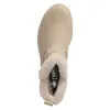A top-down view of a beige boot with a fluffy lining. Voir les images du produit