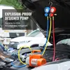 A person is working on a car engine with a vacuum pump and manifold gauge set attached. Náhľad obrázku produktu