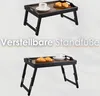 Two images of a foldable tray table, one slightly elevated and one at a lower angle, with text overlay. Anteprima dell’immagine prodotto