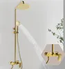 A gold shower system with water flowing from the showerhead. Náhled obrázku produktu
