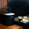 A black LEHMANN ice maker is shown on a countertop next to three glasses of drinks and ice cubes. Náhled obrázku produktu