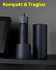 A cordless precision screwdriver and its charging base are displayed on a shelf. Voir les images du produit