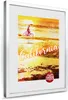 A framed picture of a beach scene at sunset with a person riding a bicycle. Produktbild-Vorschau