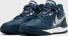 A pair of navy blue Nike basketball shoes with silver accents. Náhľad obrázku produktu