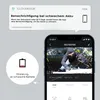 A smartphone displaying a security camera feed of a burglar, with a notification bubble about low battery and a separate graphic indicating a low battery reminder. Náhled obrázku produktu