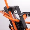 A close-up view of the mechanical components of an orange and black motorcycle lift. Produktbild-Vorschau