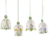Four decorative ceramic bells with floral designs hang from green ribbons against a white background. Produktbild-Vorschau