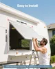 A man is installing a white awning over a window on the side of a recreational vehicle. Produktbild-Vorschau