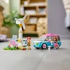 A LEGO Friends set featuring a car, a wind turbine, and two mini-doll figures on a wooden floor. Náhled obrázku produktu