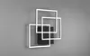 A modern geometric wall light fixture with overlapping square frames. Náhľad obrázku produktu