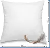 A white pillow on a white background with a feather. Náhled obrázku produktu