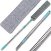 A cleaning brush with a telescopic handle and a microfiber cloth. Anteprima dell’immagine prodotto