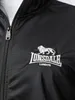 Close-up of a black Lonsdale jacket with the brand logo. Anteprima dell’immagine prodotto