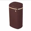 A brown trash can with a gold rim and a sensor on the front, set against a white background. Voir les images du produit