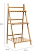 A three-tiered wooden plant stand with dimensions indicated. Produktbild-Vorschau