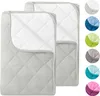 Two quilted blankets are shown laid out on a white background. To the right, there are circular swatches of different colored blankets. Produktbild-Vorschau