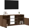 A TV stand with open doors and shelves, displaying decorative items and books. Anteprima dell’immagine prodotto