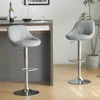Two gray bar stools are shown in a modern home interior setting. Anteprima dell’immagine prodotto