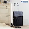 A shopping trolley is shown in front of a cabinet. Anteprima dell’immagine prodotto