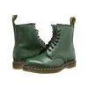A pair of green Dr. Martens boots. Produktbild-Vorschau