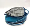 A steam iron with its base is shown against a white background. Anteprima dell’immagine prodotto