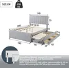 A diagram of a bed with dimensions and descriptive text. Voir les images du produit