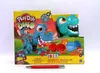 The image shows the packaging of a Play-Doh Dino T Rex toy set, with the toy itself prominently displayed on the box. Náhled obrázku produktu
