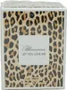A product box with a leopard print pattern and text. Anteprima dell’immagine prodotto