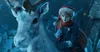 A young boy in a Santa hat rides on the back of a reindeer in a snowy, nighttime setting. Náhľad obrázku produktu