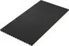 A dark, rectangular acoustic panel with a textured surface and a row of small perforations is shown from a diagonal angle against a white background. Anteprima dell’immagine prodotto