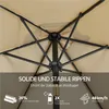 Close-up view of the underside of a beige umbrella, showing its metal frame and fabric. Produktbild-Vorschau