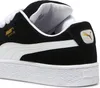 A close-up view of the side and heel of a black Puma Suede XL sneaker. Voir les images du produit