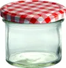A clear studio shot of an empty glass jar with a red and white checkered lid. Podgląd zdjęcia produktu