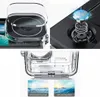 Collage of images showing a waterproof case for a camera, including close-ups of its features and a demonstration of its anti-fog capabilities. Produktbild-Vorschau