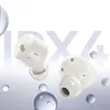 Two white wireless earbuds are shown floating against a light gray and white background with large, translucent text that reads 'IPX4'. Water droplets are scattered around the earbuds. Anteprima dell’immagine prodotto