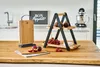 A kitchen counter with food items and serving accessories. Anteprima dell’immagine prodotto