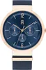 A close-up, front-facing view of a Tommy Hilfiger watch with a blue dial and rose gold accents. Produktbild-Vorschau