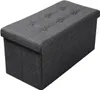 A dark gray storage ottoman with tufted top. Produktbild-Vorschau