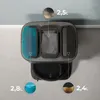 A top-down view of a robot vacuum cleaner's docking station with multiple compartments, indicating different capacities. Produktbild-Vorschau