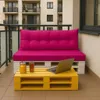 A balcony setting with a pallet sofa and coffee table, featuring drinks and a laptop. Produktbild-Vorschau